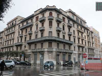 Di fronte all�edificio si erge un alto palazzo signorile di stampo "eclettico": � Palazzo Girone, costruito nel 1925